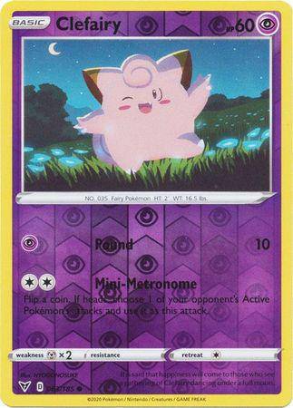 Clefairy card from Vivid Voltage set (Reverse holo) featuring a pink Pokémon in a grassy field with a purple background.